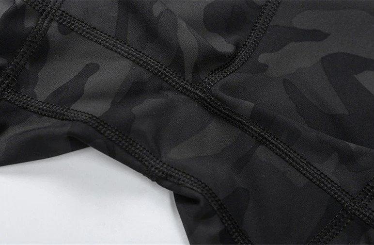 Close-up of black camo pattern on Sports Short Elastic Women's Training Shorts, showcasing stitch detail and texture.